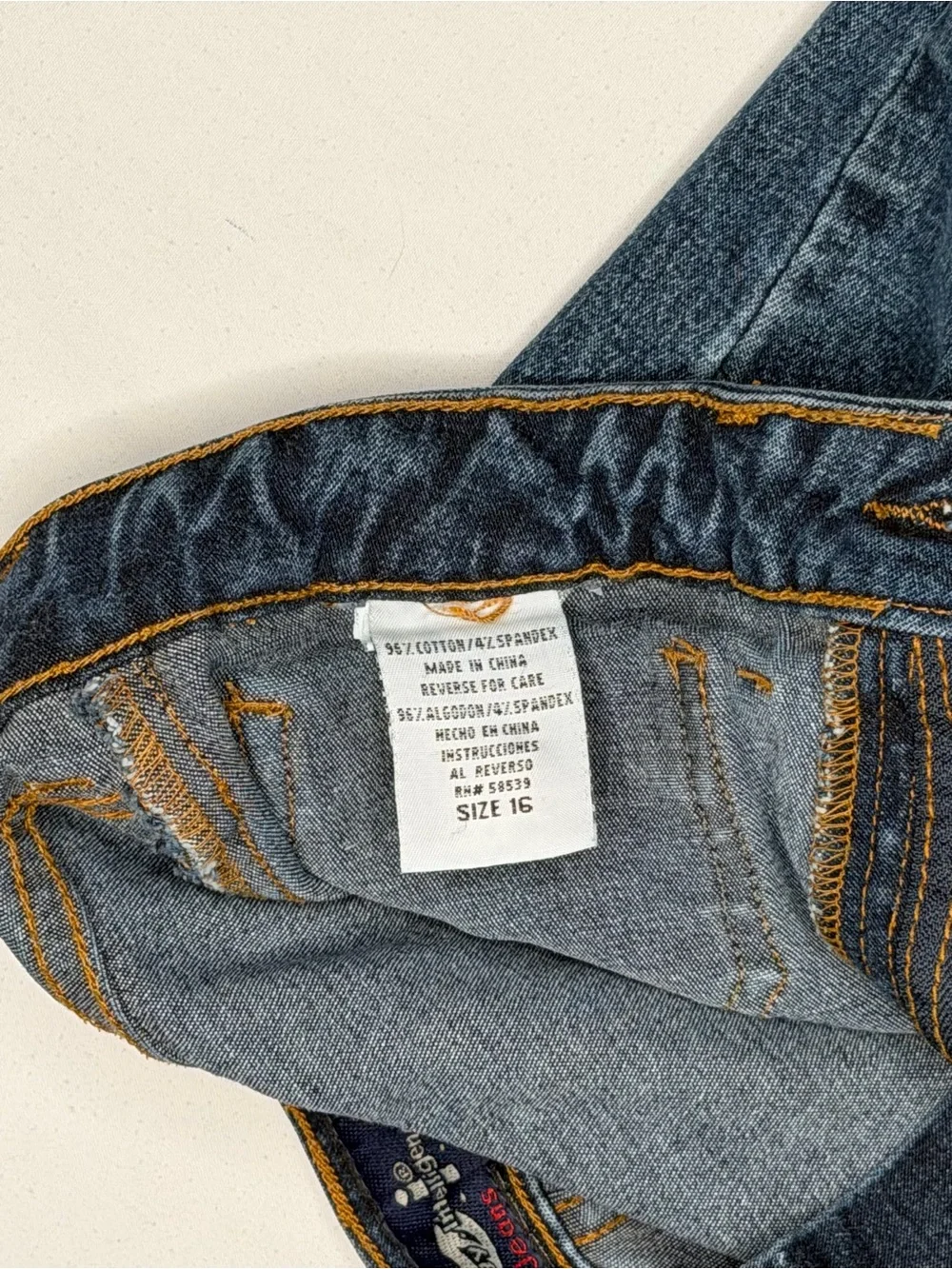 Vintage mid-wash blue denim l.e.i. bootcut jeans for girls.
